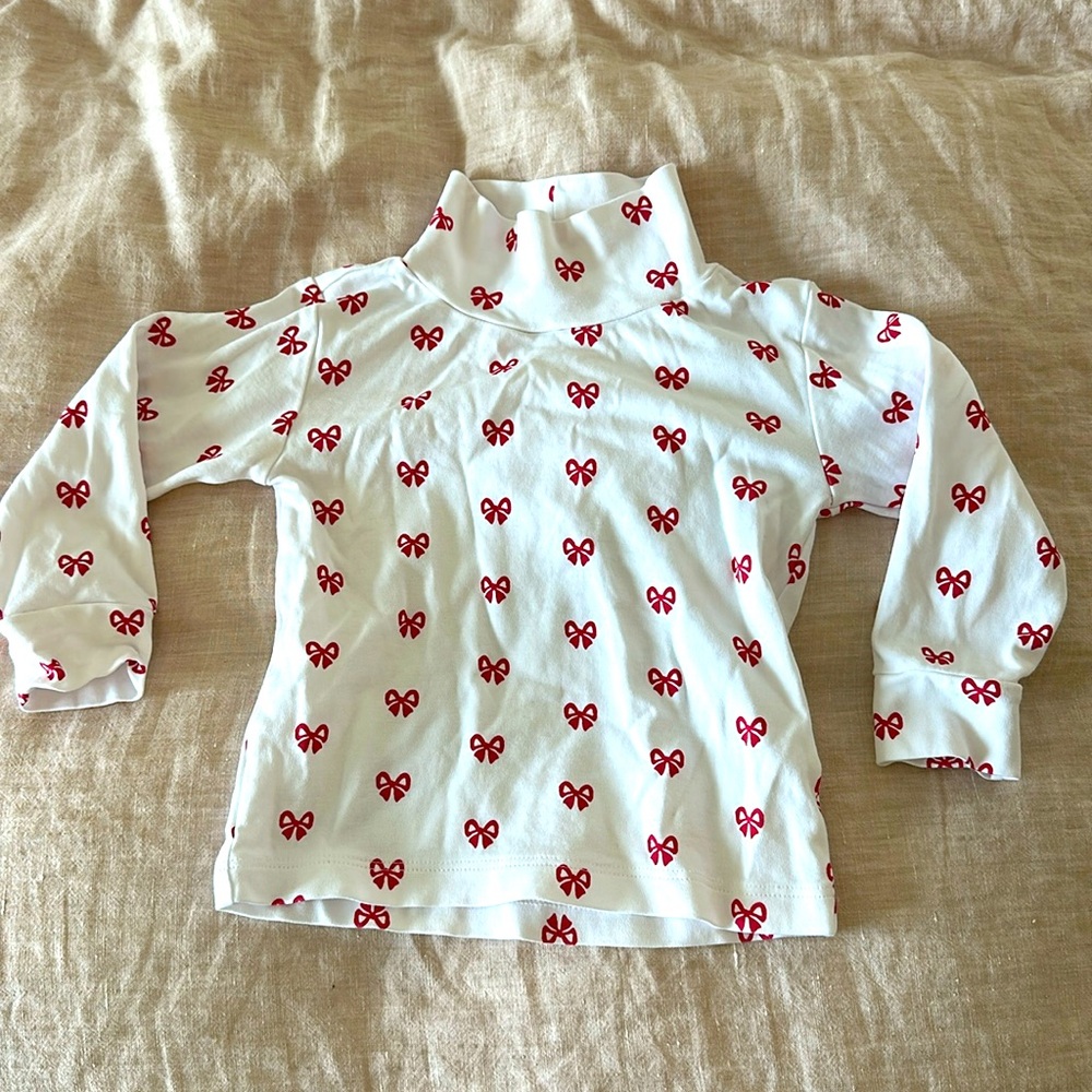 Little English White Turtleneck Top with Red Bow Print